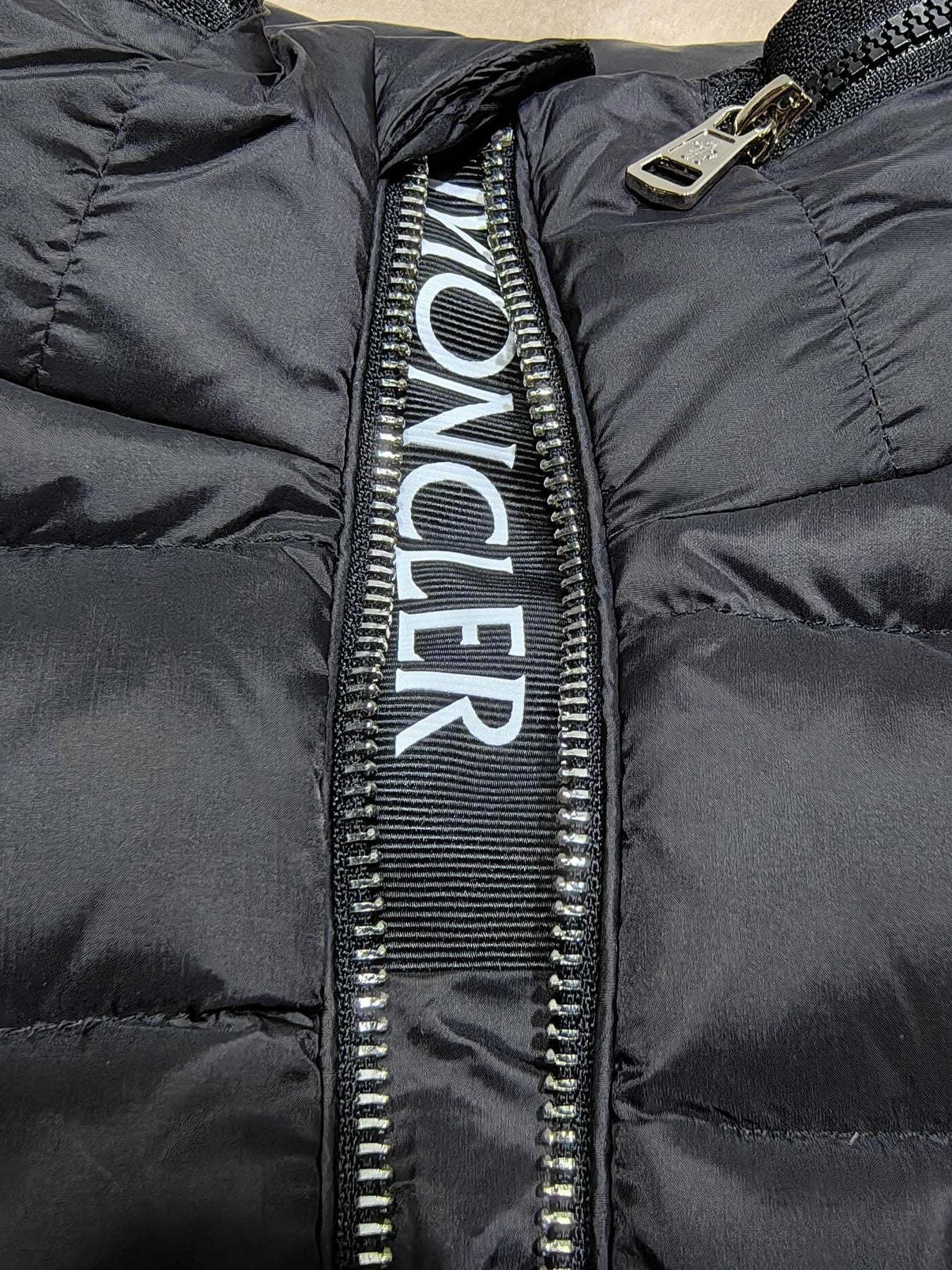 Moncler Hidden Lettering Down Vest — detail