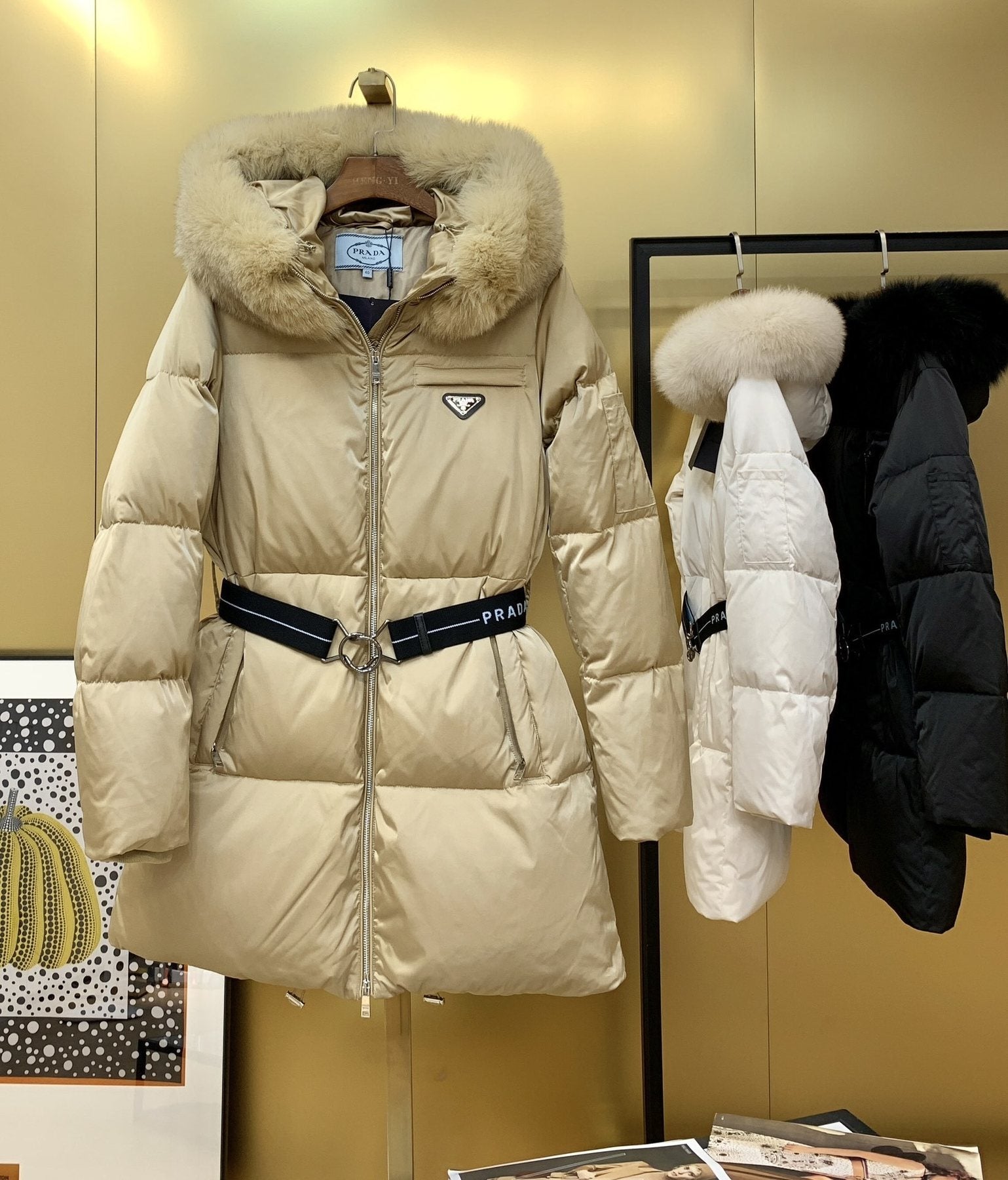 Prada Long Belted Puffer Jacket — front