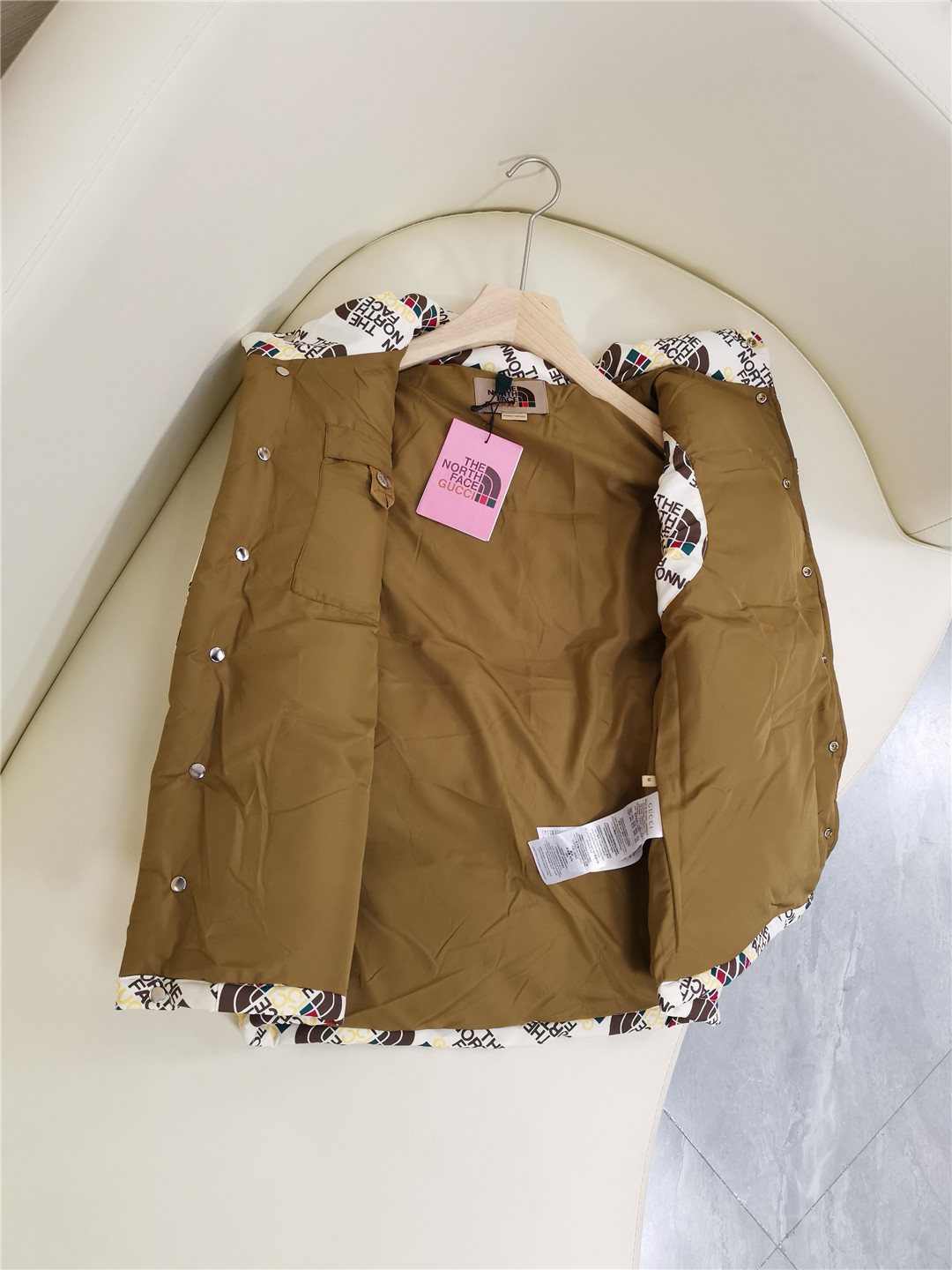 The North Face x Gucci White Diagonal Logo-Print Quilted Vest — detail