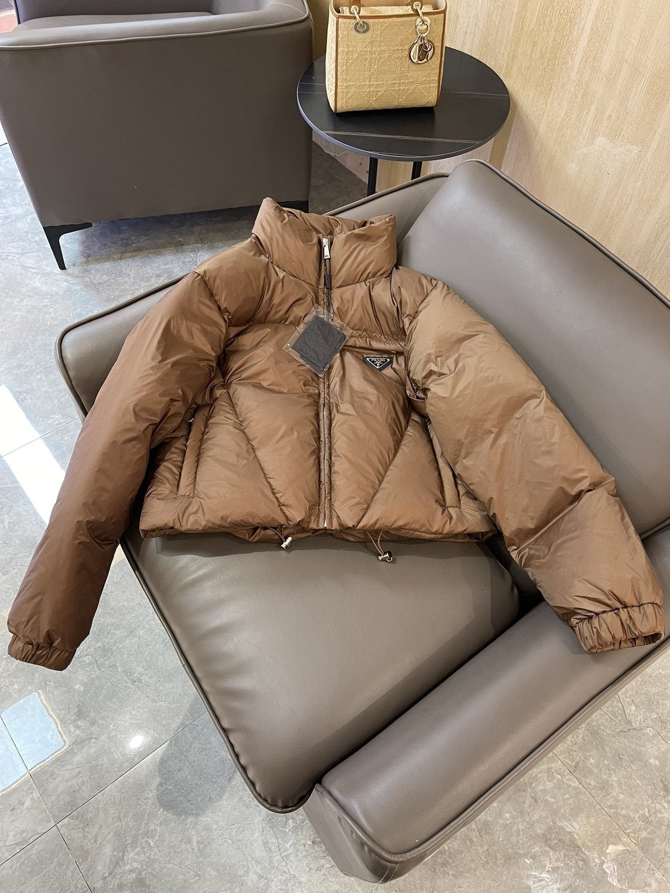 Prada Triangle Plaque Short Down Jacket — front