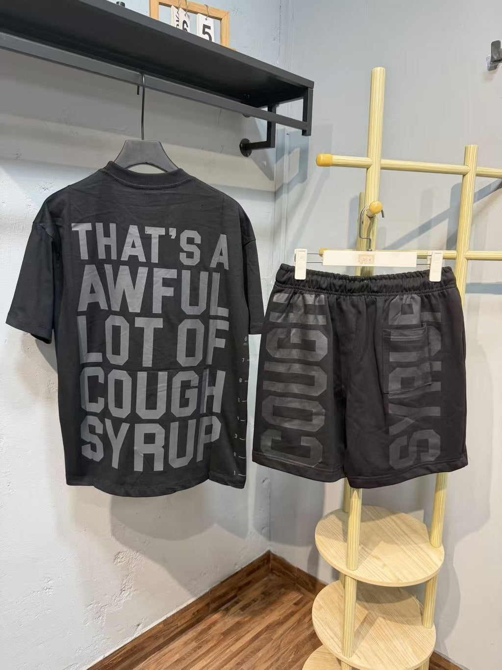 THAT'S A AWFUL LOT OF COUGH SYRUP Graphic Short-Sleeve Set — back
