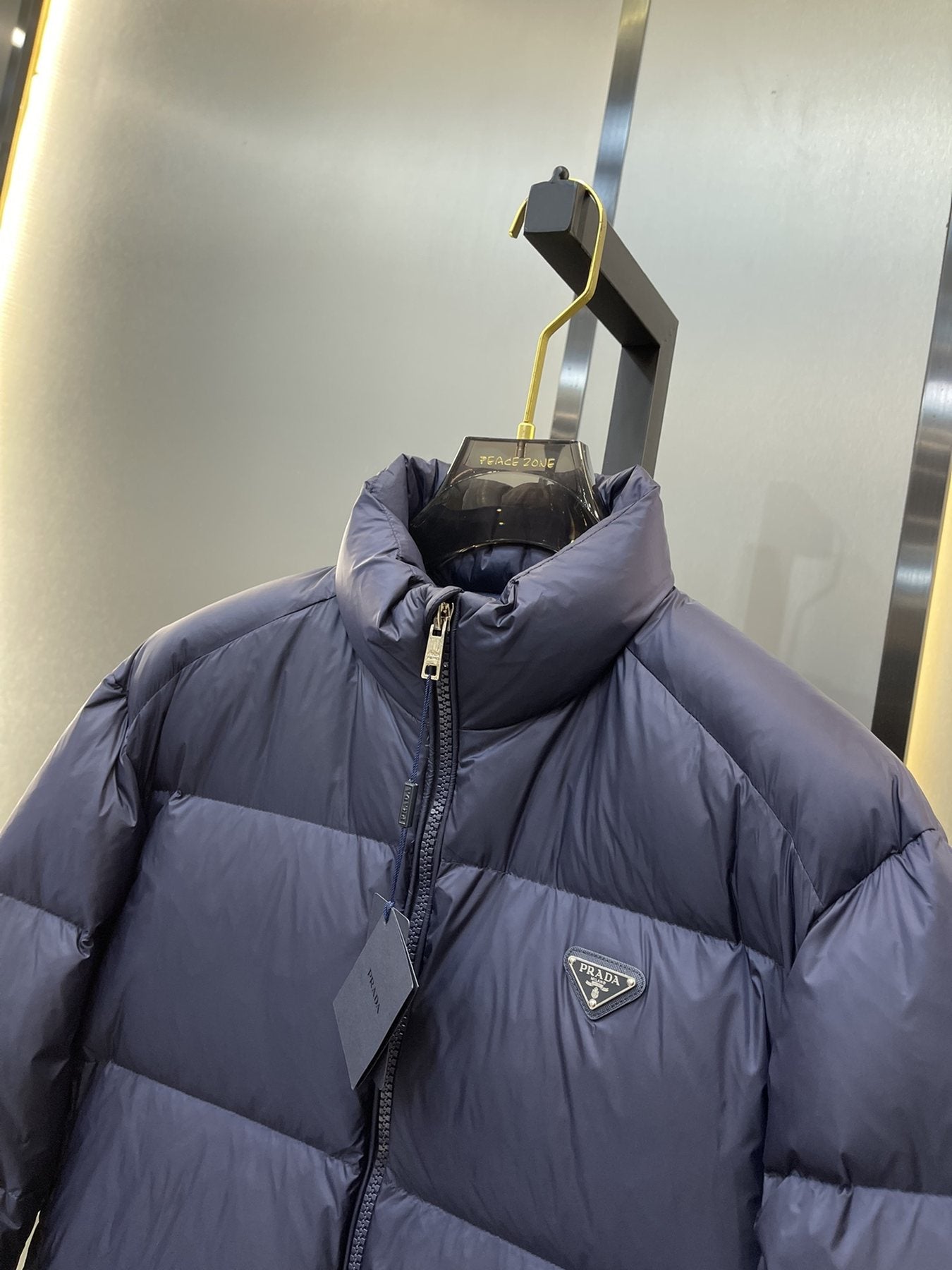 Prada Quilted Stand-Collar Puffer Jacket — detail